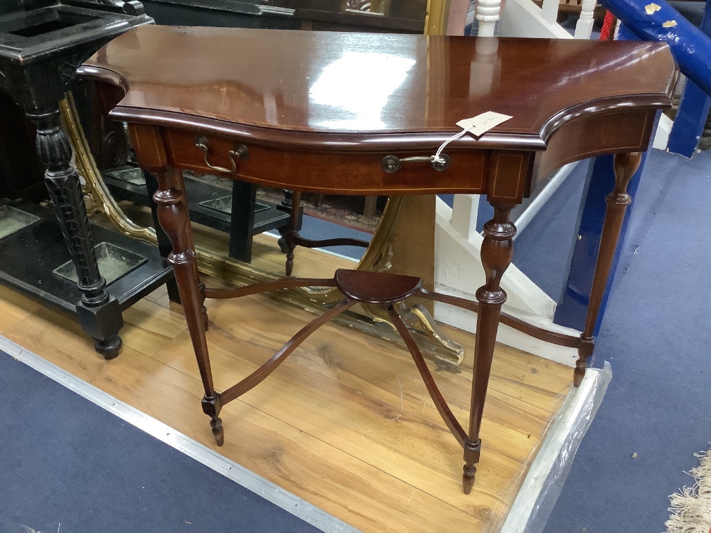 A reproduction mahogany serpentine console table, width 98cm, depth 46cm, height 73cm